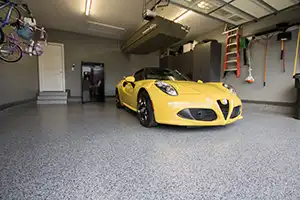 garage floor with yellow car