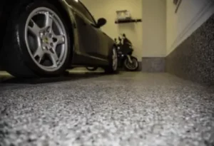 garage floor with black car