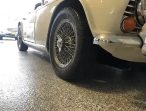 garage floor with beige car