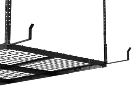 A black metal overhead storage rack is mounted to the ceiling. The rack consists of a grid platform and four brackets for added support. The adjustable brackets are attached to vertical supports and positioned to hold items securely.