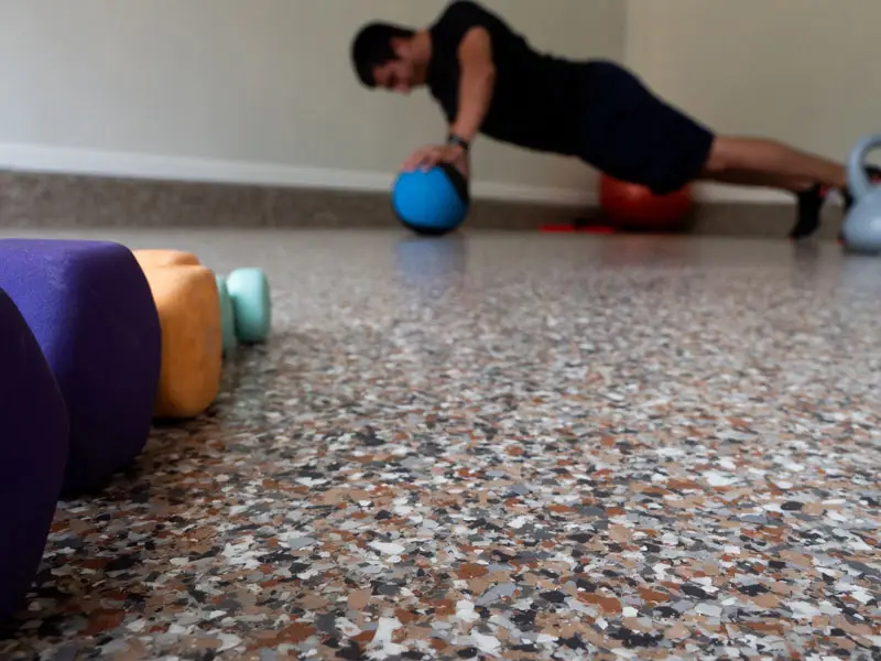 Garage Kings can transform your basement floor, so you can have the fitness center you've always wanted.