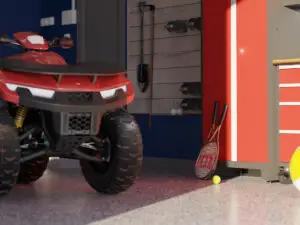 A red ATV is parked in a garage with a blue wall. Tennis rackets and a tennis ball are on the floor beside a red tool cabinet, and sports equipment hangs in the background—perfect for your next Monthly Promo hero shot.