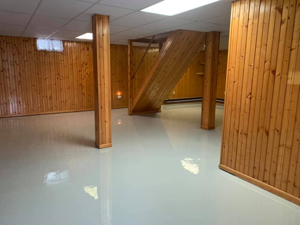 The finished product from a Garage Kings basement floor resurfacing project
